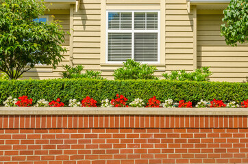 Luxury house with outdoor landscape at sunny day in Vancouver, Canada.