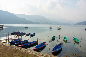 Fototapeta na wymiar boats on the lake Phewa Lake, Pokhara, Nepal