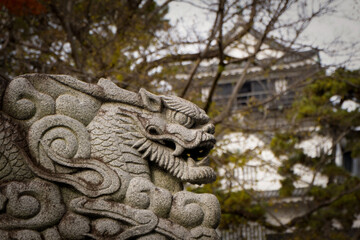 Fototapeta na wymiar stone lion statue Japan