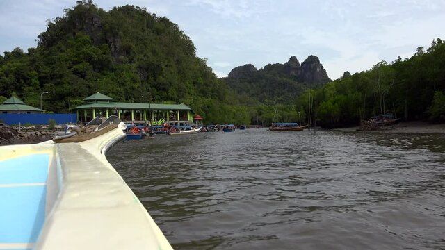 boat trip in malaysia mangoove forest and caves.