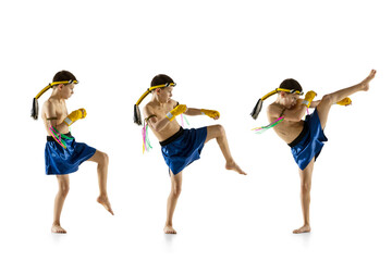 Little boy exercising thai boxing on white background. Fighter practicing, training in martial arts...