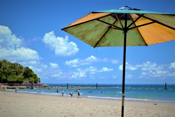 beach with umbrella Salvador Brasil