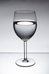 Glass full of water on a white background