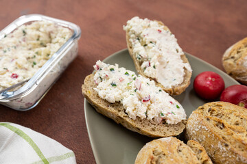 Fresh sandwiches with white cheese and radish. View from above.