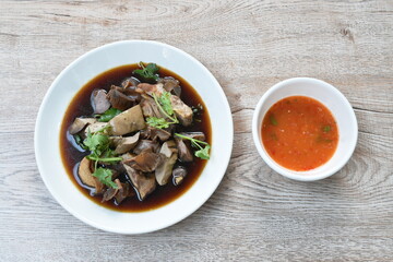 boiled duck liver and intestine in black soybean sauce dipping spicy chili sauce