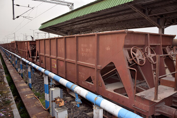 Stationary Goods train on a railway station in India - obrazy, fototapety, plakaty