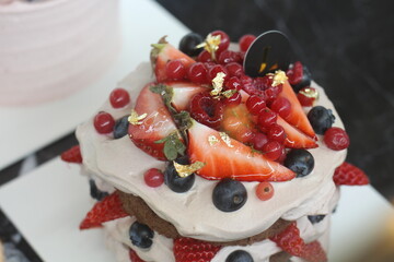 cake with strawberries and cream
