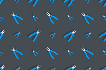 Background of metal pliers with rubber handles. Tools seamless pattern.