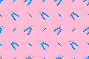 Tools seamless pattern. Background made of tools, pliers and an adjustable wrench.