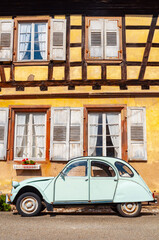 Plakat Wissembourg, France. September 13th, 2009. Old car in the historic center of Wissembourg.