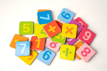 Math number colorful on wooden background, Education study mathematics learning teach concept.