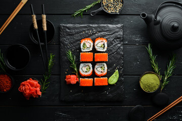 Japanese sushi rolls with crab. Sushi menu for the restaurant. Top view.