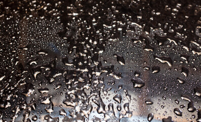 Ice on a black metal background.