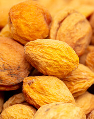 Dried apricots as an abstract background.