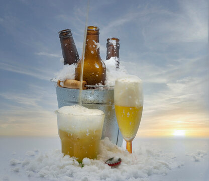 Bottles of cold beer on a sky background