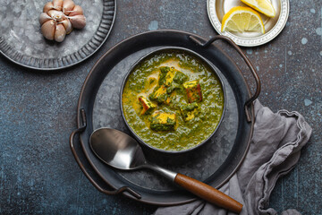 Food cooking background on white stone rustic table with fresh ingredients, vegetables, herbs, spices, olive oil from above with space for text