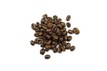 Pile of coffee beans isolated on white background. Roasted coffee beans top view.