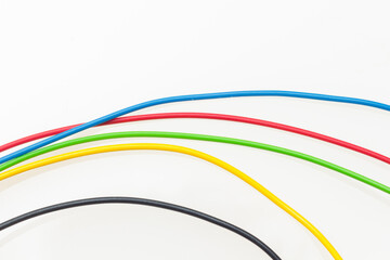 Colored wires on white background