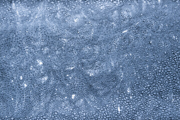 Fototapeta premium abstract background: frozen glass, short focus, toning