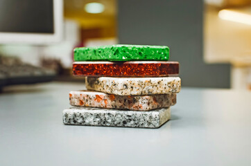 close up interior artificial stone samples background containing black marble ,grey terrazzo ,grey stone. interior stone material for counter top ,table top finishing.