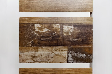 Samples of material for the production of kitchen countertops with wood texture.