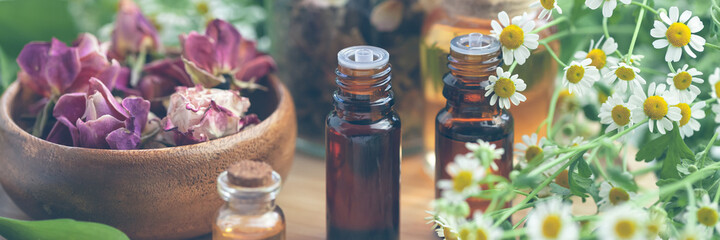 Assortment of organic essential oils. Natural moisturizing body and face treatment. Rose, camomile...