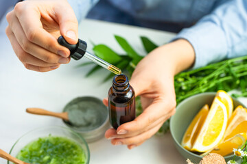 Woman performing professional cosmetics research. Concept of natural organic ingredients in...