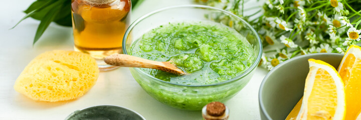 Concept of natural organic ingredients in cosmetics. Essential oil, extract of fruits and vegetables. Natural moisturizing body, face care. Camomile essence for healthy young skin. Close up banner