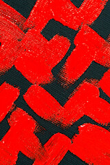 abstract creative background: red spots, strokes and splashes of colored primer when toning a black...