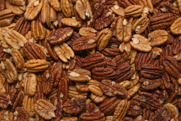 Tasty pecan-nut background. Top view.