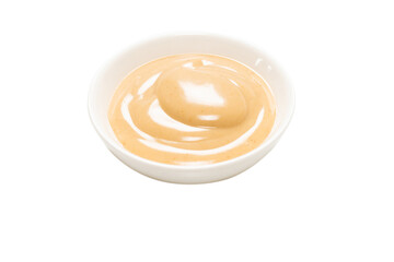 Mushroom sauce in a bowl isolated on white background.