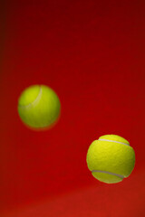 Tennis ball isolated on orange background