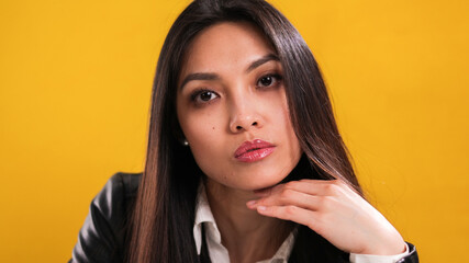 Pretty Asian girl in close-up - studio photography