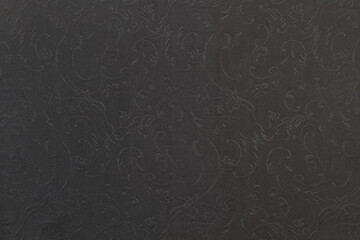 Fondo textura de tela oscura con trama bordado y dibujos