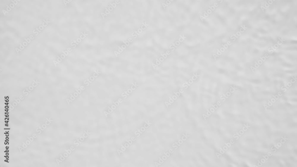 Poster up close, top view, slow motion various waves of the water surface hitting the sun's rays, making th