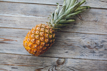 pineapple on wooden background