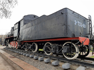 Fototapeta na wymiar Steam locomotive on the square