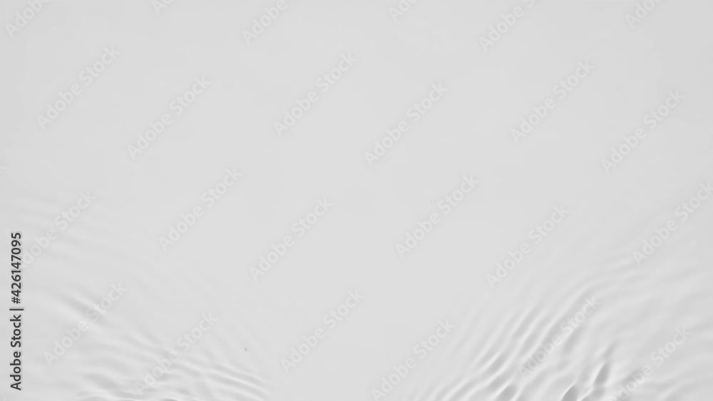Poster up close, top view, slow motion various waves of the water surface hitting the sun's rays, making th