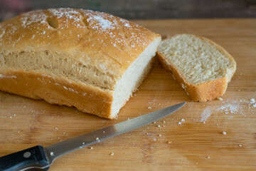 Homemade white wheat bread in the form. Step-by-step cooking process for baking at home in the oven.