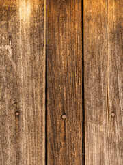 Old brown dark wood texture dark background.