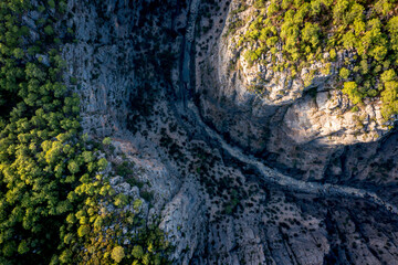 Extreme top view on Tazi Canyon (Bilgelik Vadisi) in Manavgat, Antalya, Turkey. Amazing landscape and cliff. Greyhound Canyon, Wisdom Valley.