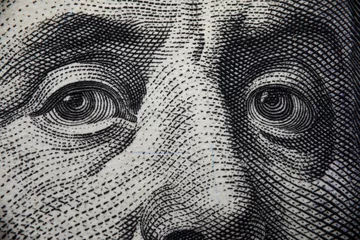 Fotobehang Close-up of benjamin franklins face on hundred banknote © megaflopp