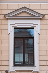 Windows on old city facades, with decorative elements