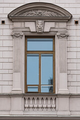 Windows on old city facades, with decorative elements