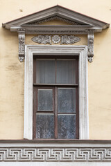 Windows on old city facades, with decorative elements