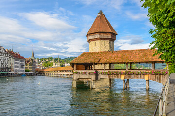 Chapel bridge is located on Lucerne historical city center, it's the famous and symbol of Switzerland's main tourist attractions.