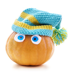Pumpkin in a striped hat with a pompom.