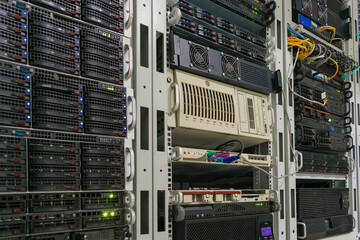 There are racks with powerful computer equipment in the server room. There are many different...