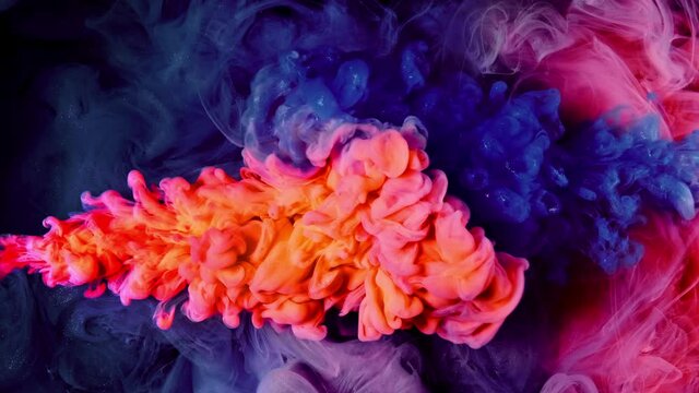 blue orange colors paint slow motion ink flow with splash isolated on black, 4K