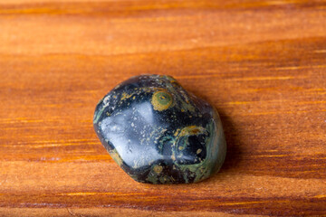 Kambaba Jasper, close-up on wooden table